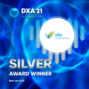 'DXA 21' text sits in the top left corner over a graphic blue and aqua background. The vita logo sits in a white circle in the middle and the text 'SILVER AWARD WINNER" sits bottom left.