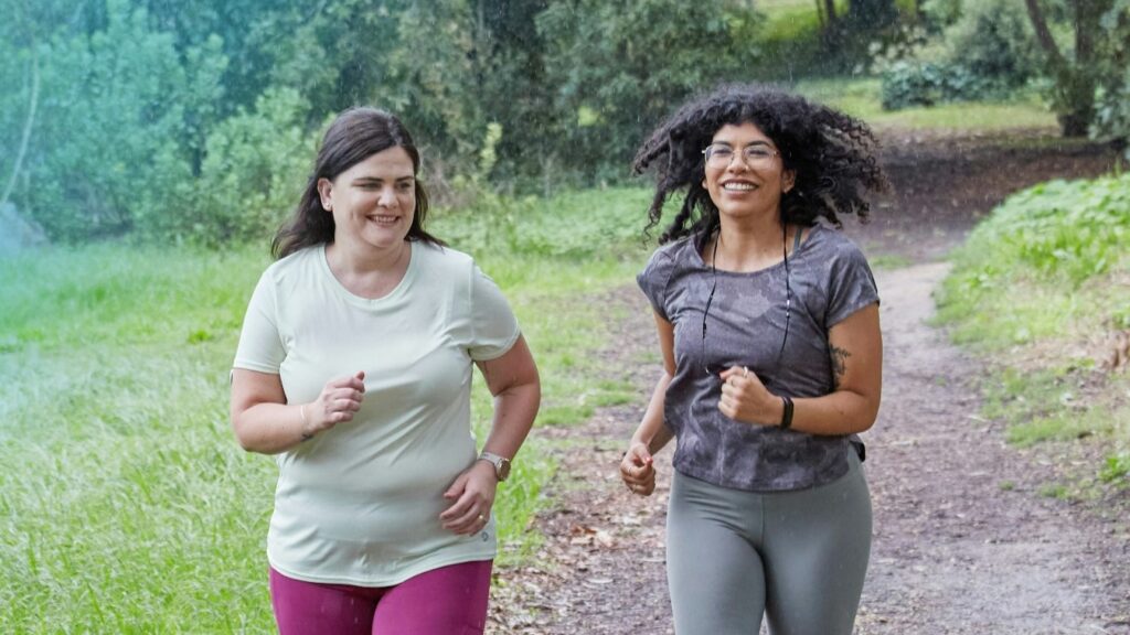 two women running