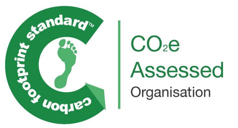 Green circular logo with a footprint, labeled 