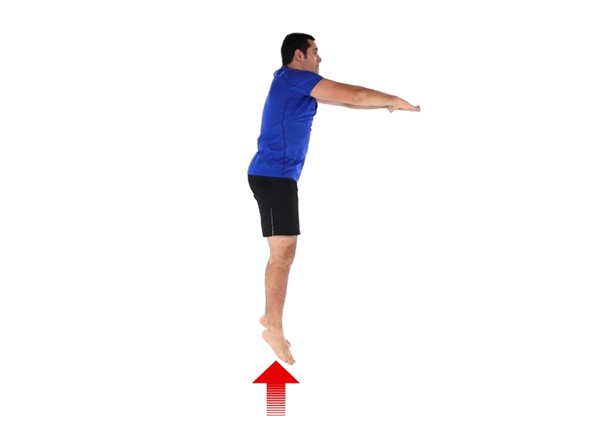 A person in a blue shirt and black shorts jumps upward with arms extended forward against a white background. A red arrow points up from their feet, indicating movement.