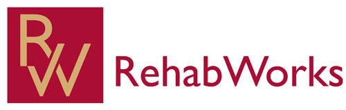 Red square with orange letters 'R W' sits to the left of the text 'RehabWorks' in a red sans serif typeface.