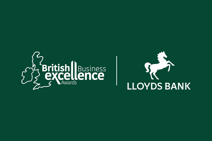 Two white logos sit on top of a dark green background. The logo on the left is an outlined map of th UK with the text 'British Business Excellence Awards' and the logo on the right is the Lloyds horse symbol with the text 'LLOYDS BANK' sat underneath.